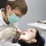 How painful is the process of removing a crown from a tooth?