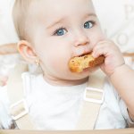 child eats cracker